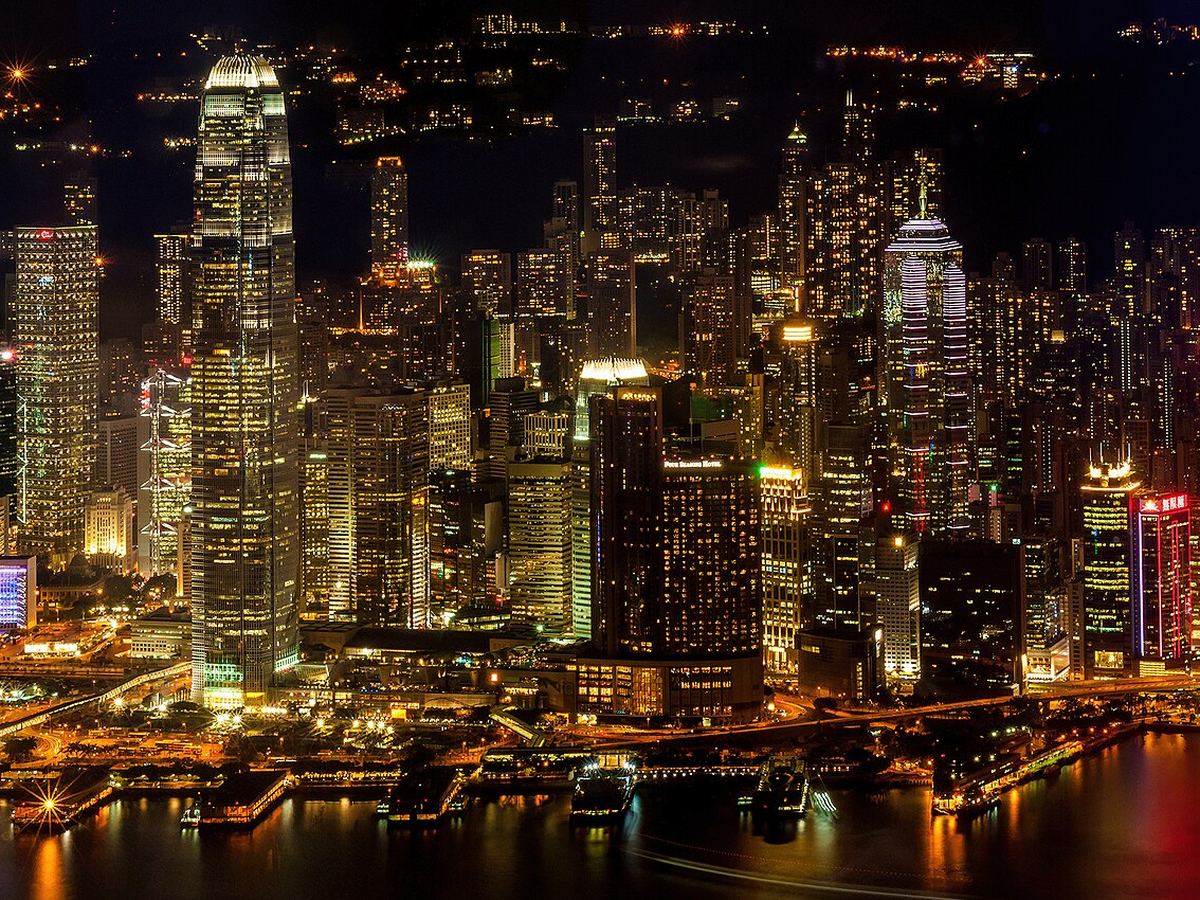 Hong Kong skyscrapers along Victoria Harbour at night